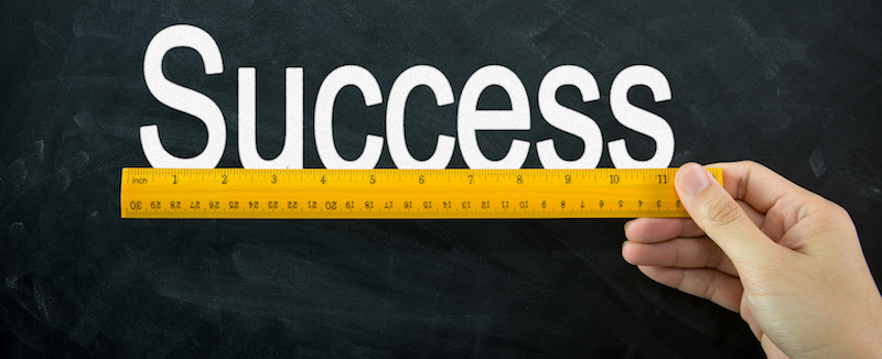 Ruler displayed on blackboard, representing the Definition of Customer Success