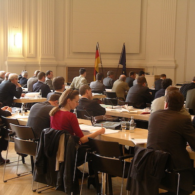 Conference room with people seated