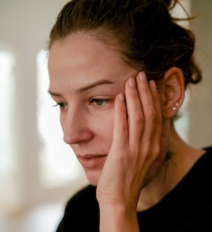 Image of a woman reacting to stress
